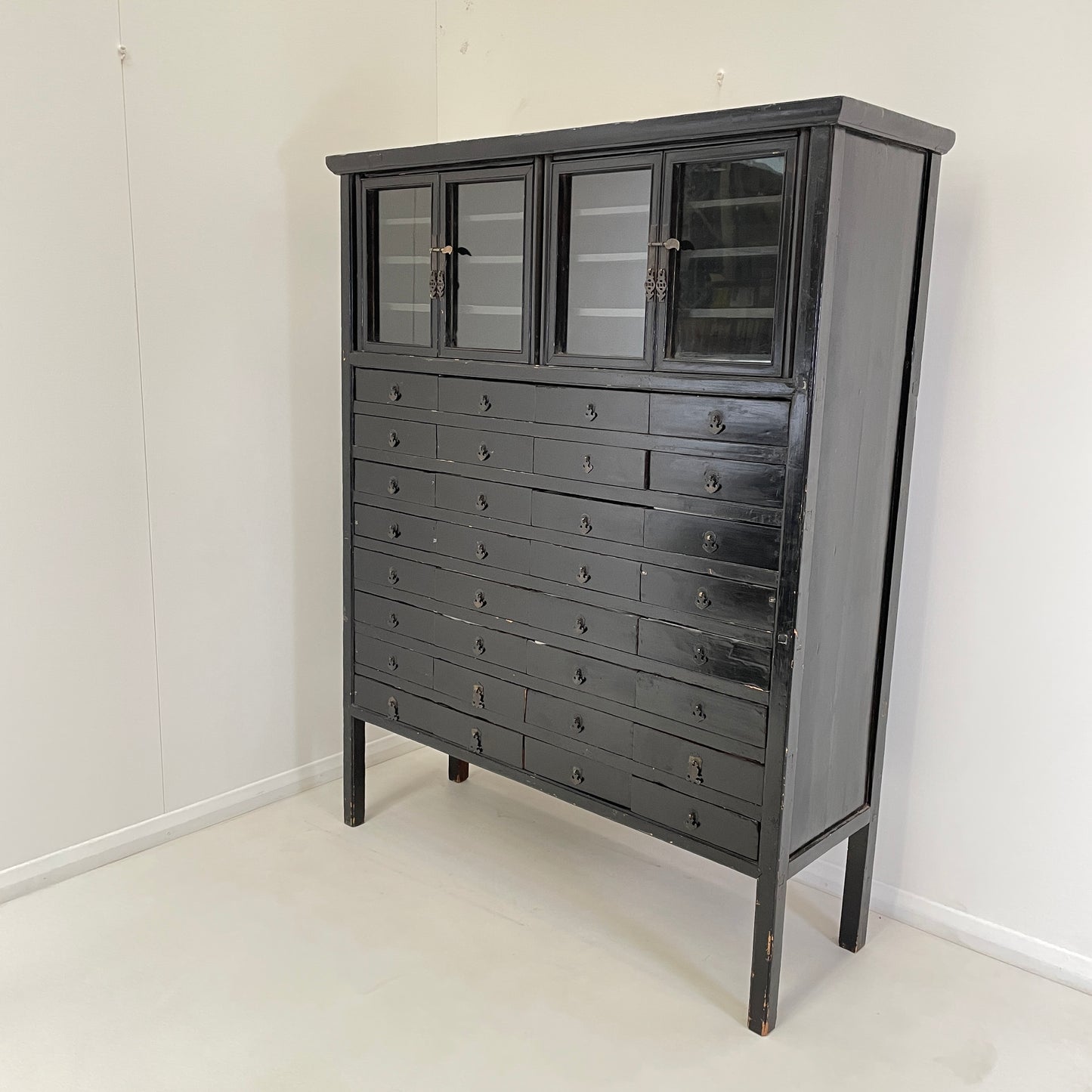EBONISED CHINESE APOTHECARY CABINET WITH GLAZED DOORS