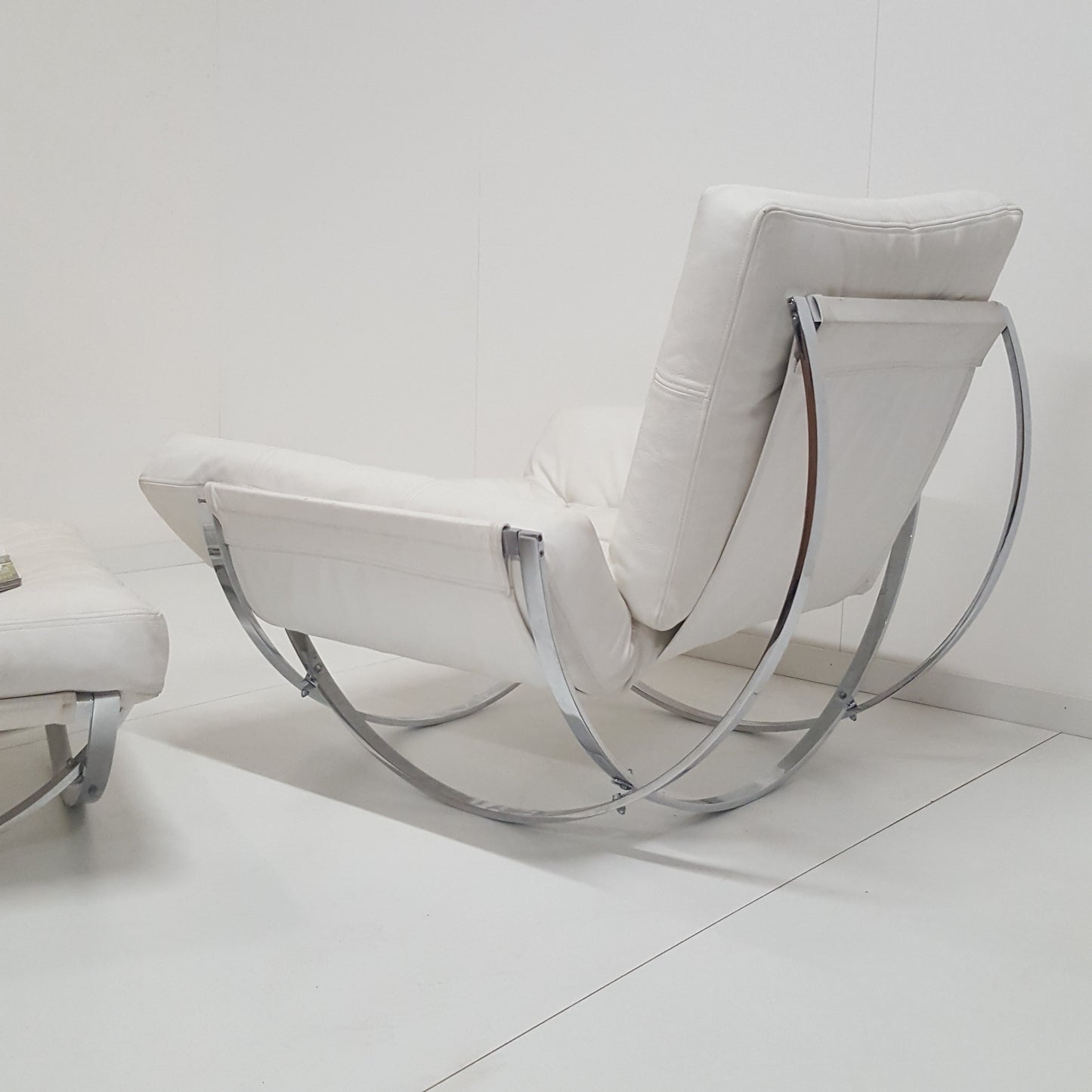 ITALIAN WHITE LEATHER STENDIG CHAIR AND OTTOMAN