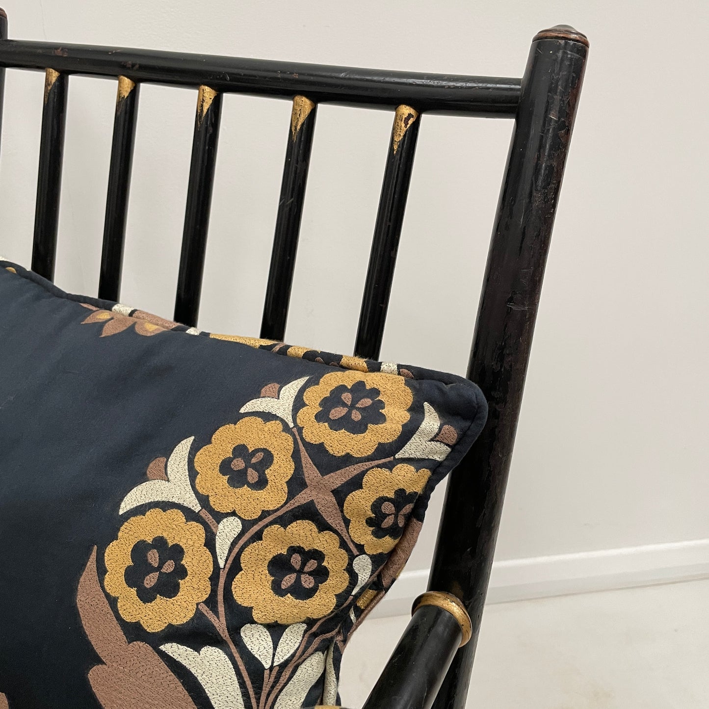 ANTIQUE BLACK EBONISED LIBRARY CHAIR ON CASTORS