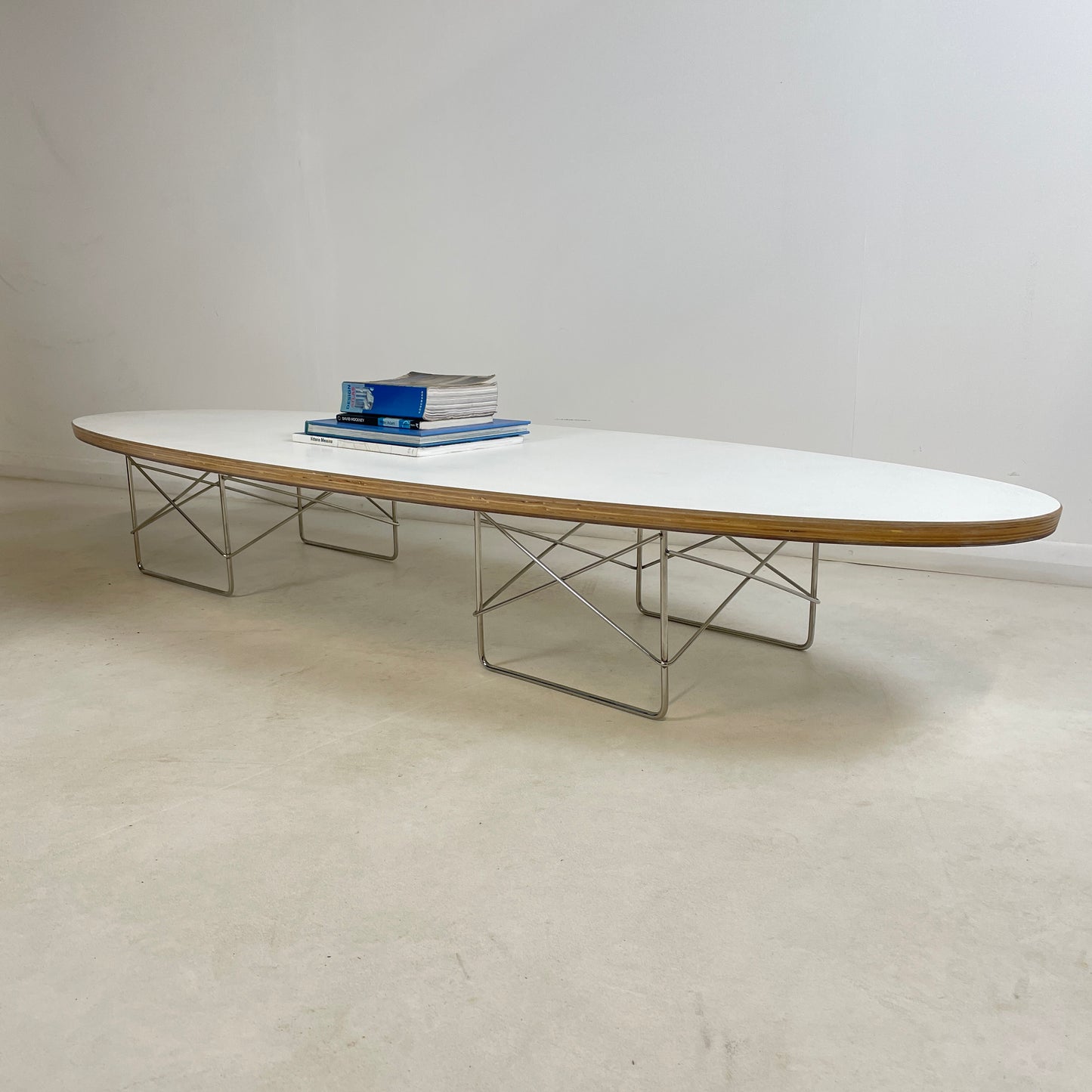 CONTEMPORARY ELIPTICAL LOW WHITE COFFEE TABLE