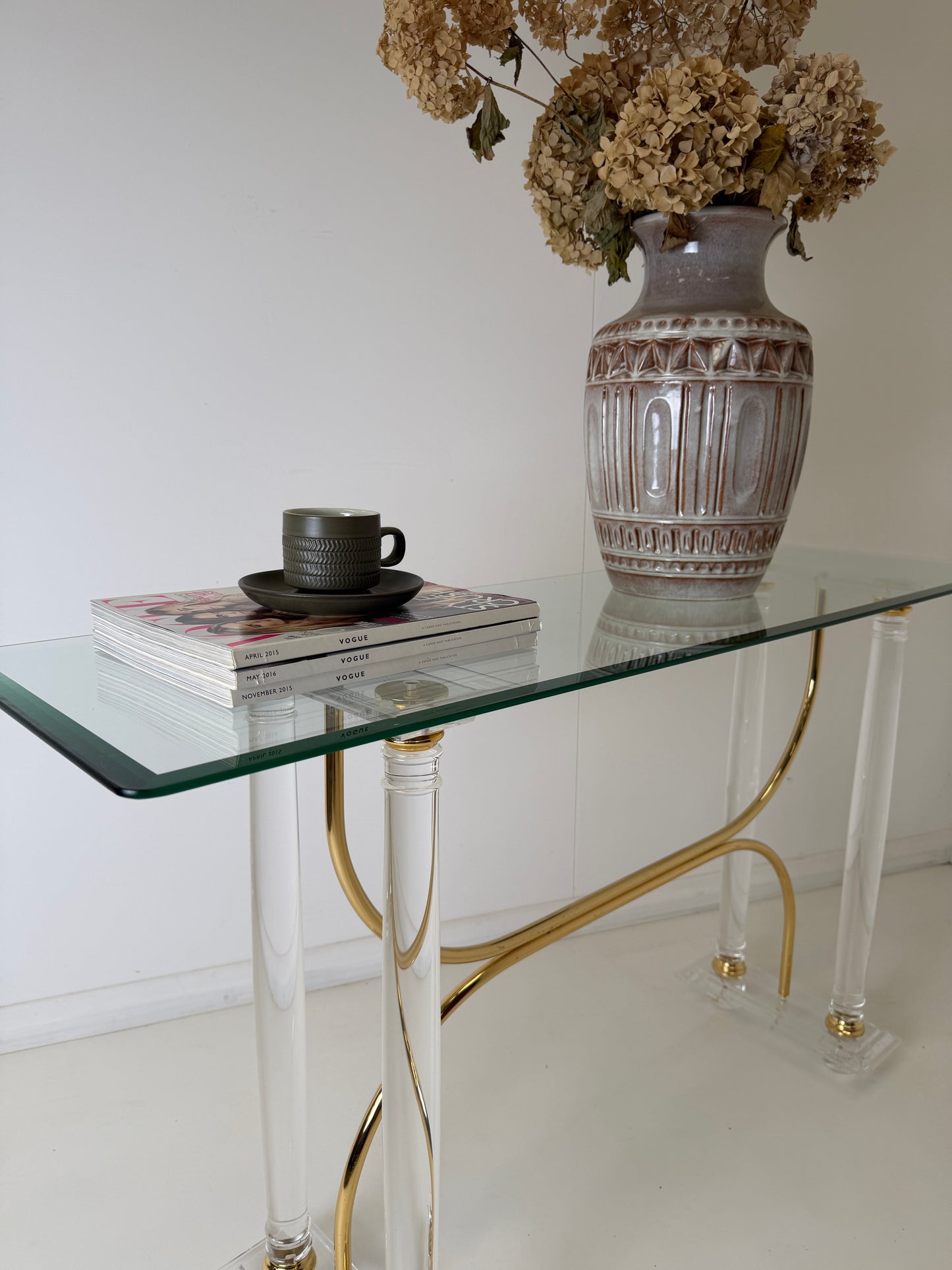 HOLLYWOOD REGENCY CONSOLE TABLE IN THE STYLE OF CHARLES HOLLINS