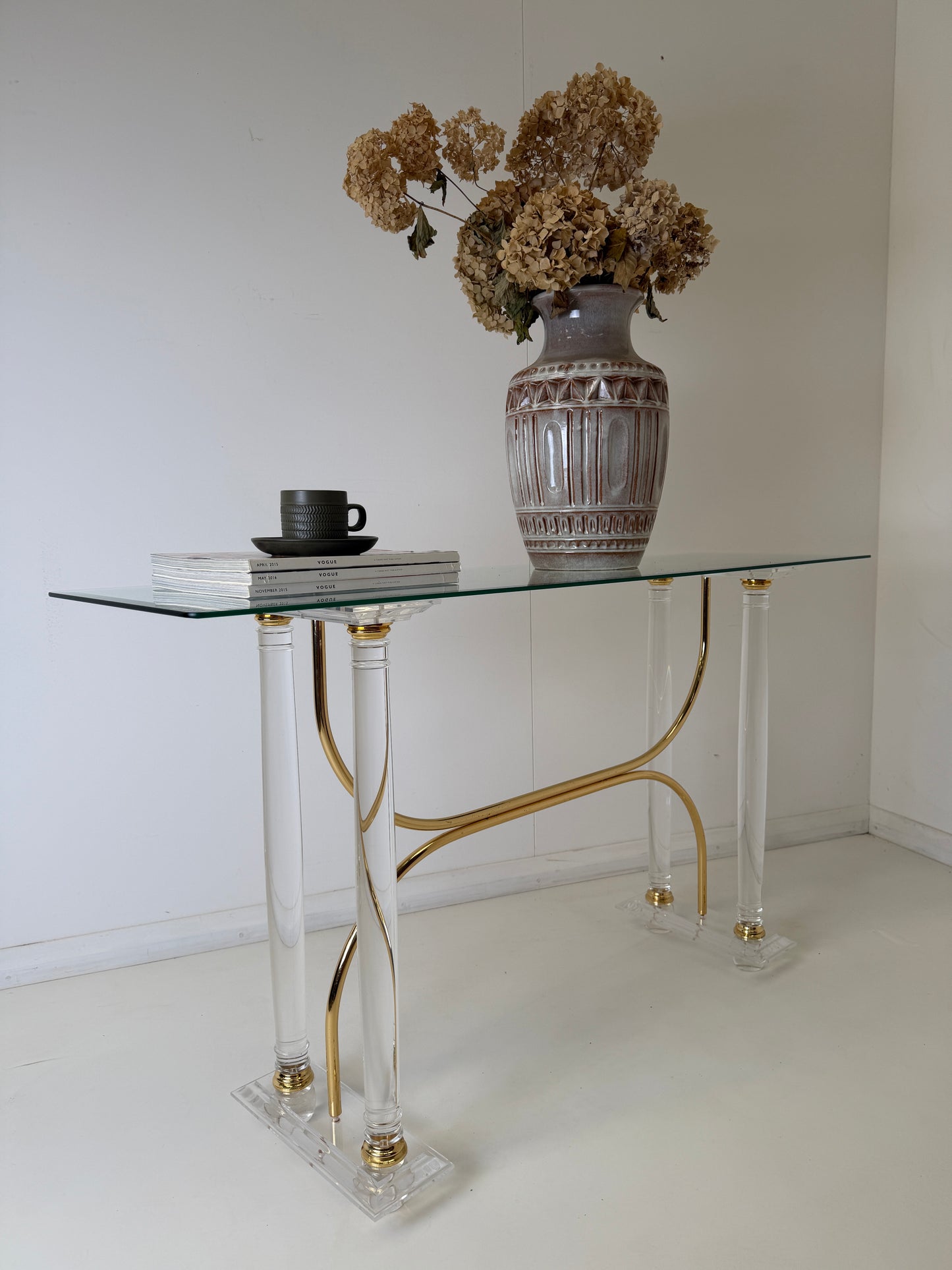 HOLLYWOOD REGENCY CONSOLE TABLE IN THE STYLE OF CHARLES HOLLINS