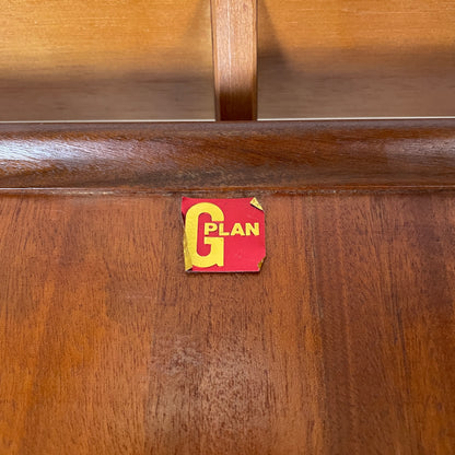 the underside of the table has the original Gplan sticker intact to show its authenticity. The sticker is the gplan brand logo in gold on a red background