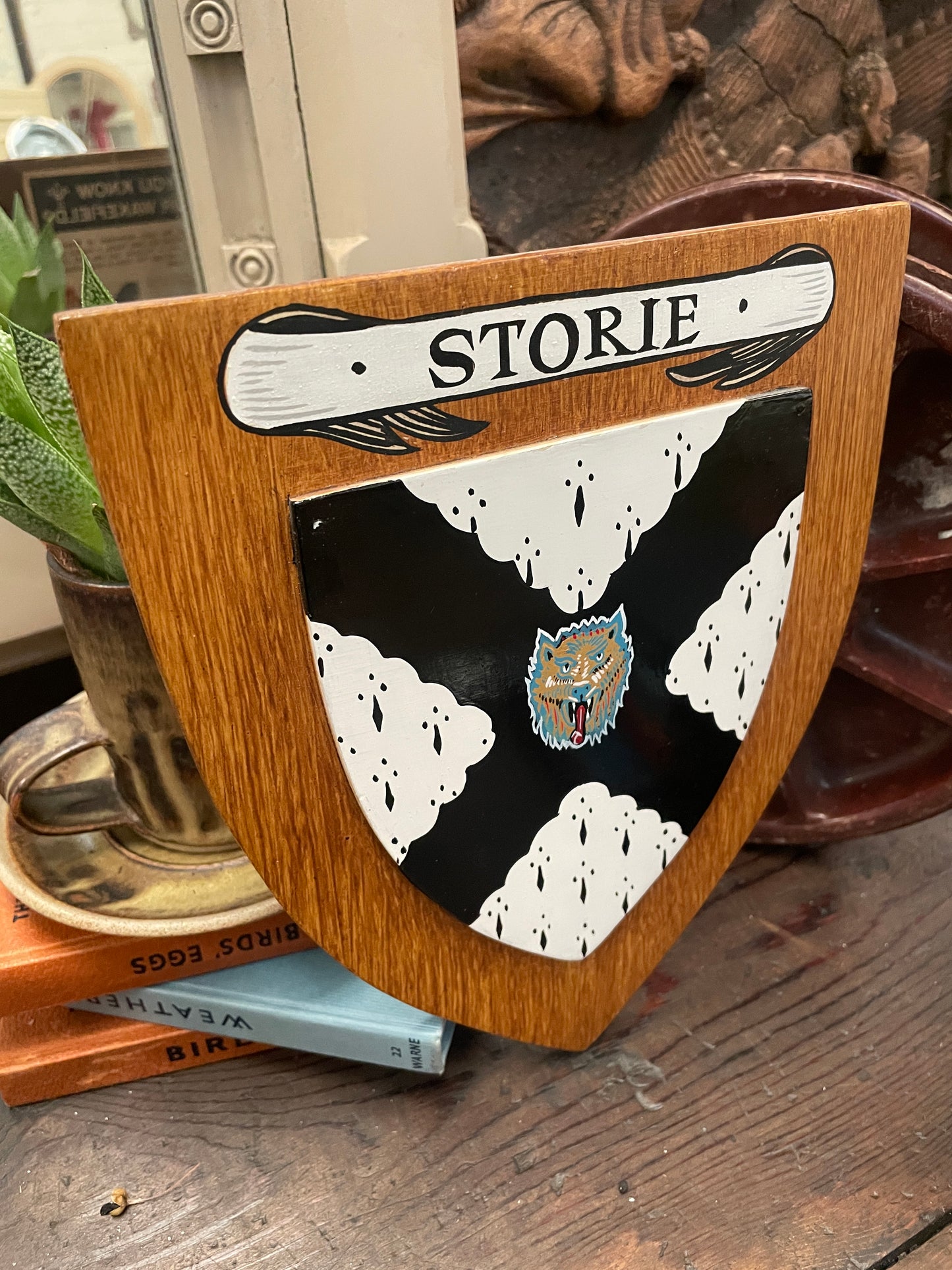 VINTAGE WOODEN SHIELD HAND PAINTED PLAQUE - STORIE