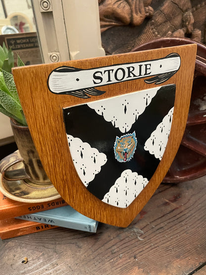 VINTAGE WOODEN SHIELD HAND PAINTED PLAQUE - STORIE