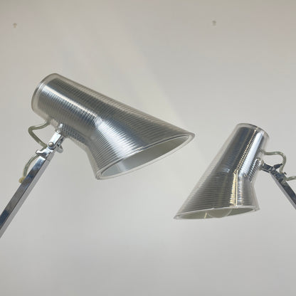 the two lamp heads are shown at two different angles, you can see where the bulbs go and how you can adjust the lamp heads to focus the light on a specific area