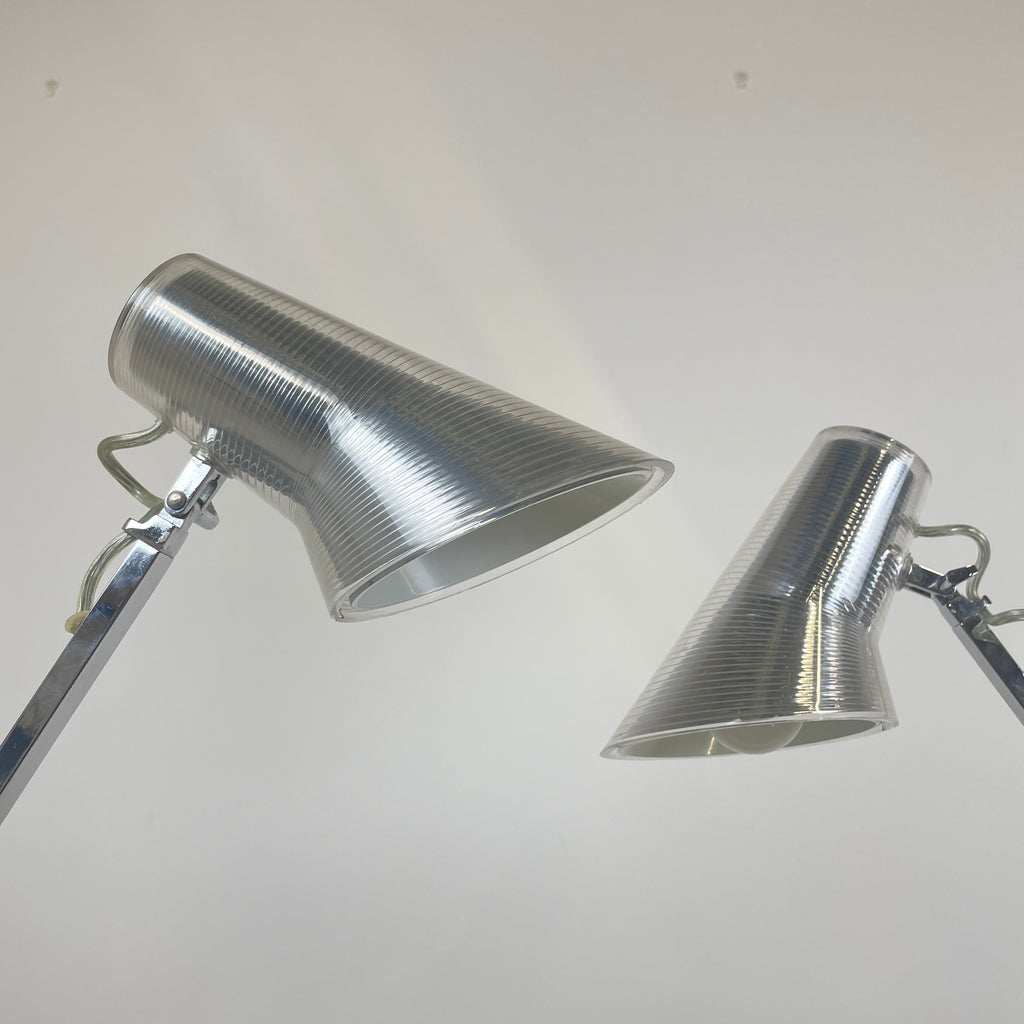 the two lamp heads are shown at two different angles, you can see where the bulbs go and how you can adjust the lamp heads to focus the light on a specific area