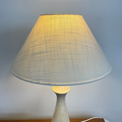 The bespoke shade is pictured as a close up image, you can see the light shining through the fabric, the fabric is strong high quality in a sublte shade of powdery white/blue. Taken against a white background
