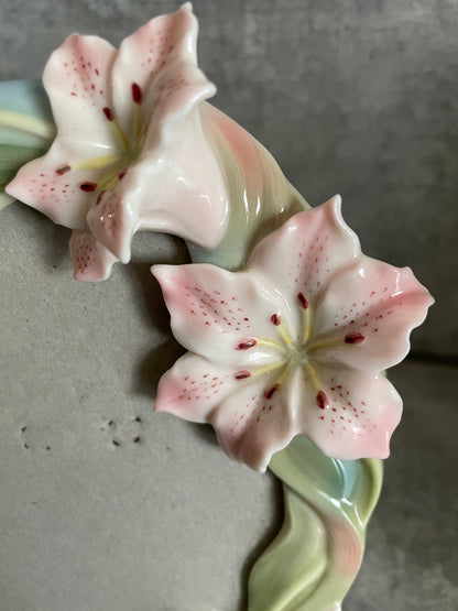 the beautiful Porcelain oriental Lillies on the frame surround closer up, their pink and white petals and insides of flowers. Ornate & Beautiful the flowers are intact and free from any damage. 